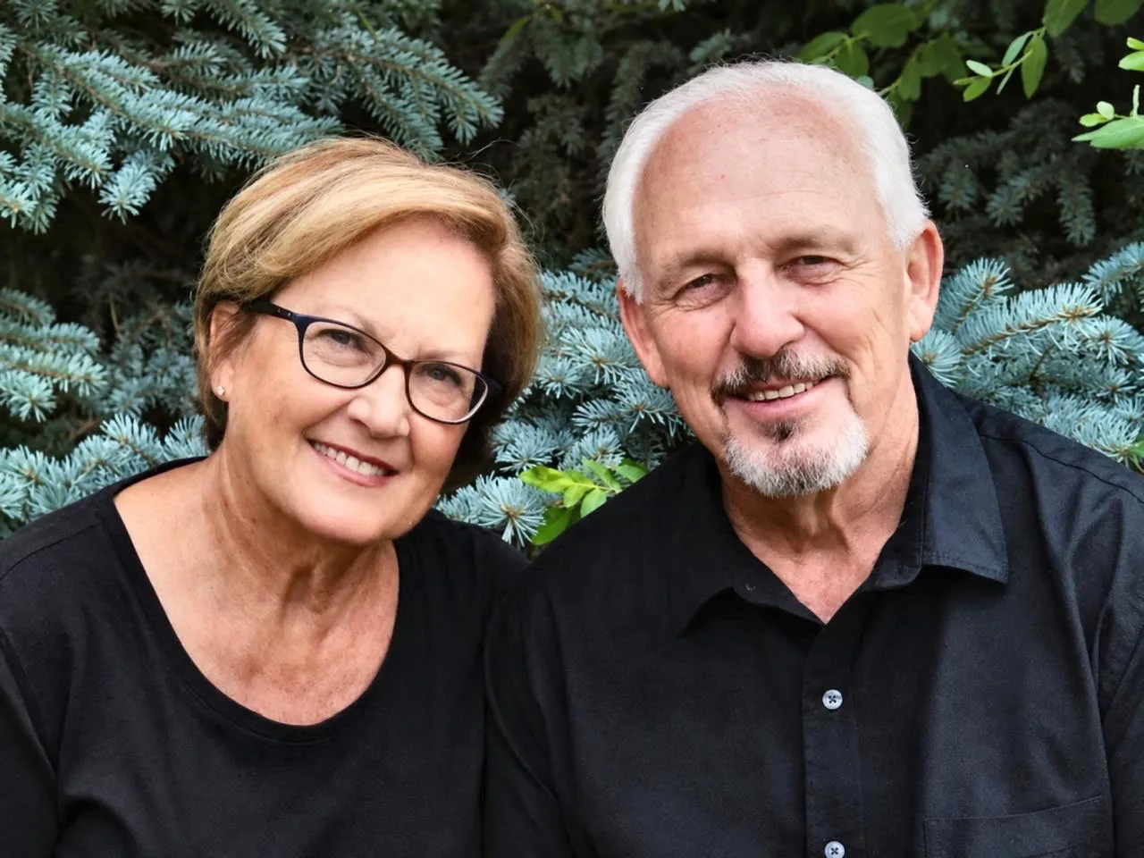 The founders of Garden Ministries smiling together outdoors